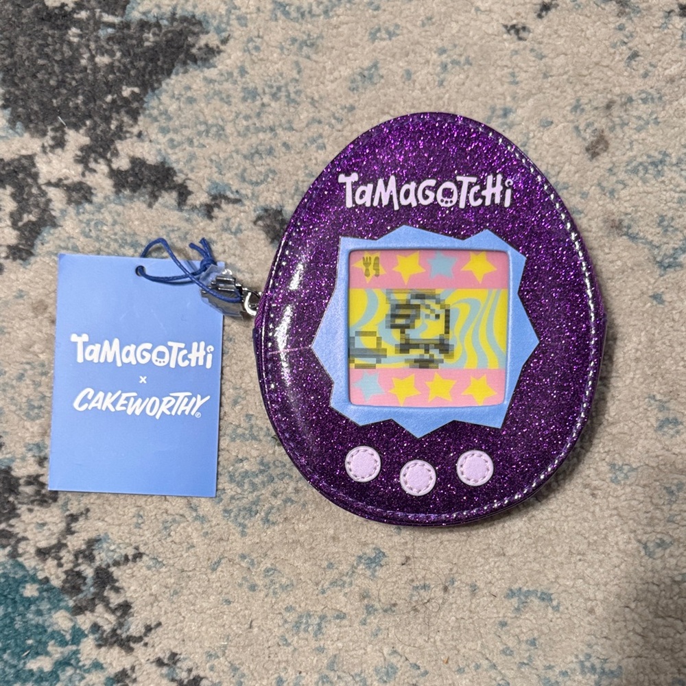 Tamagotchi Glitter Egg Mini Bag in Purple